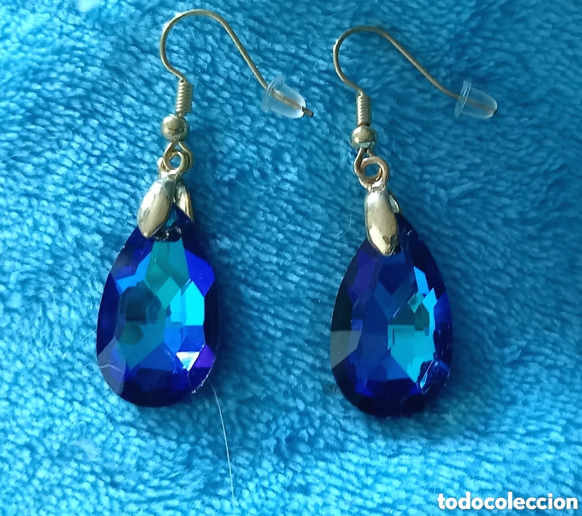 Joaillerie: Originales pendientes de gancho dorados gota de agua, l&aacute;grima facetada azul con reflejos 2,5cm Largo