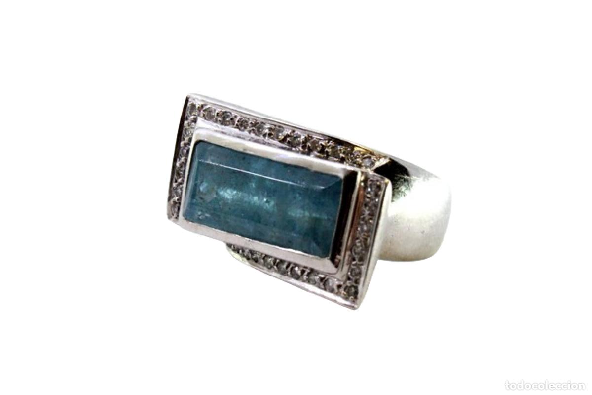 Joalharia: Anillo de oro de 19,2K con diamantes y tanzanita.