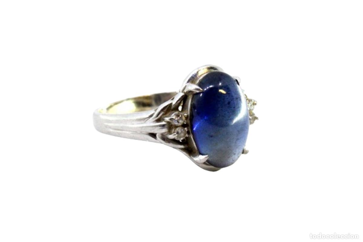 Joyeria: Anillo de oro de 19,2 quilates con diamantes y zafiro