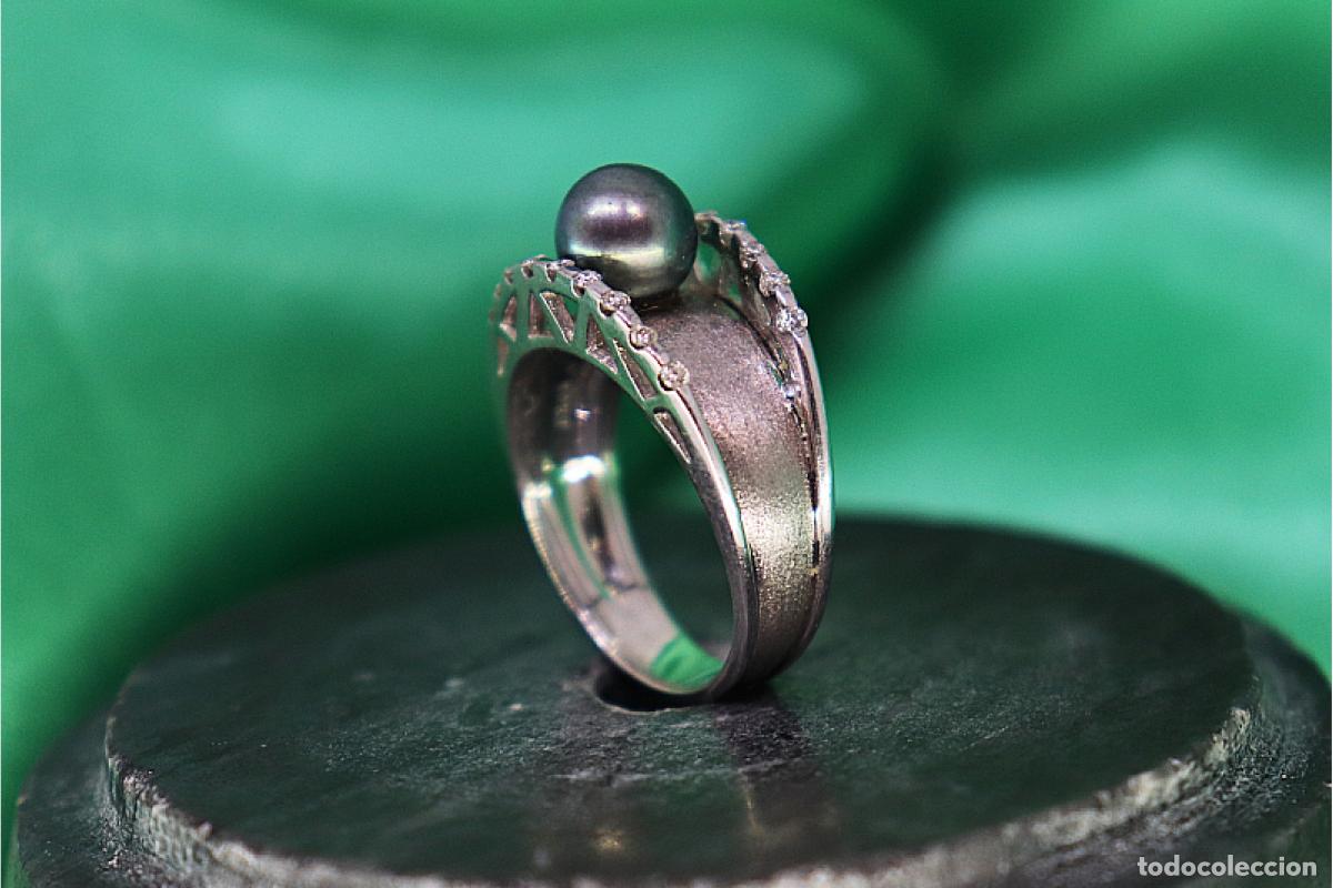 Gioielleria: Anillo de oro blanco de 19,2K con diamantes y perla negra.
