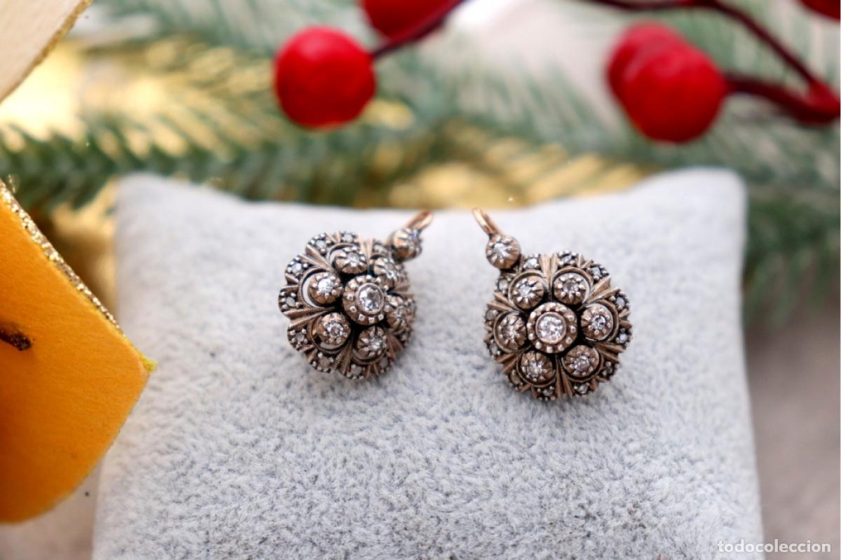 Joalharia: Pendientes en oro de 19,2K y plata con diamantes.