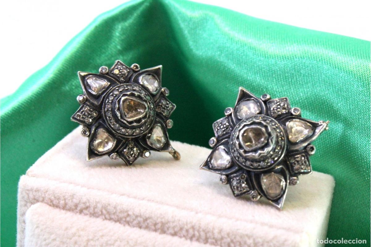 Joalharia: Pendientes en oro de 19,2K y plata con diamantes.