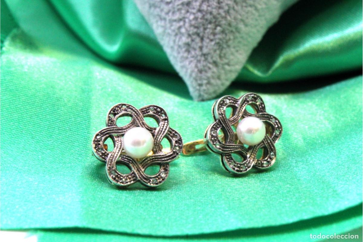 Jewelry: Pendientes en oro y plata de 19,2K con diamantes y perlas.