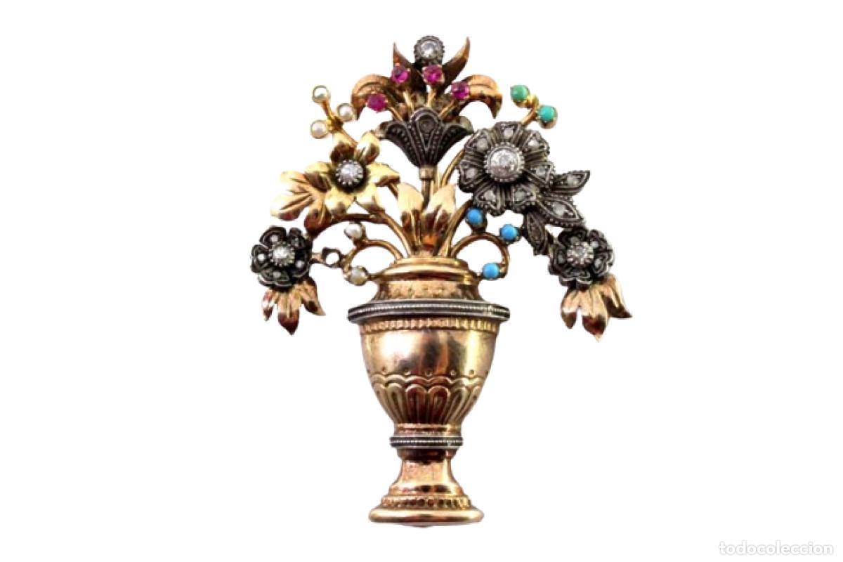 Schmuck: Broche en oro y plata de 19,2K con diamantes, rub&iacute;es y perlas.