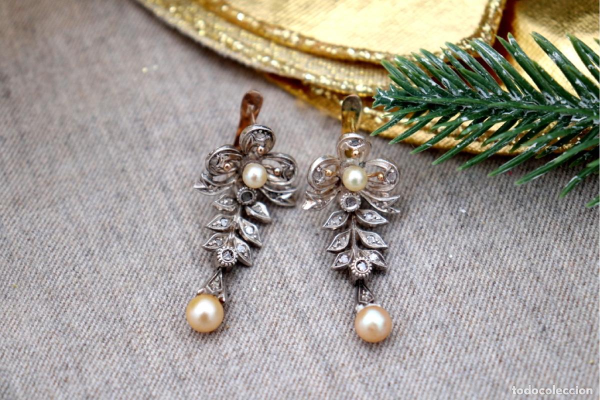 Gioielleria: Pendientes en oro de 19,2K y plata con diamantes.