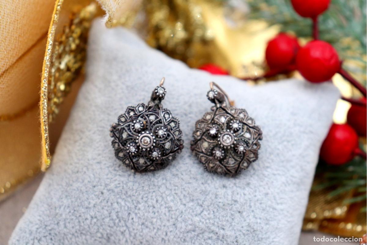 Gioielleria: Pendientes en oro de 19,2K y plata con diamantes.