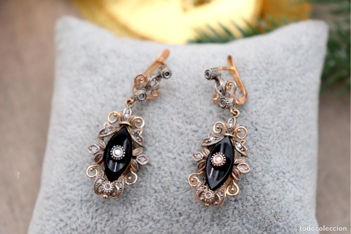 Schmuck: Pendientes en oro de 19,2K y plata con diamantes.