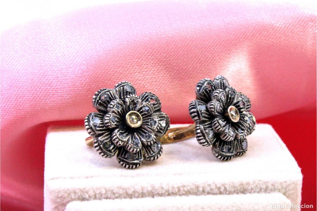 Gioielleria: Pendientes en oro de 19,2K y plata con diamantes.