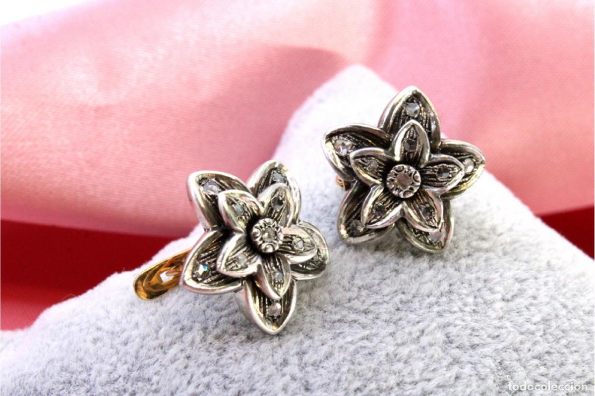Joyeria: Pendientes en oro de 19,2K y plata con diamantes.