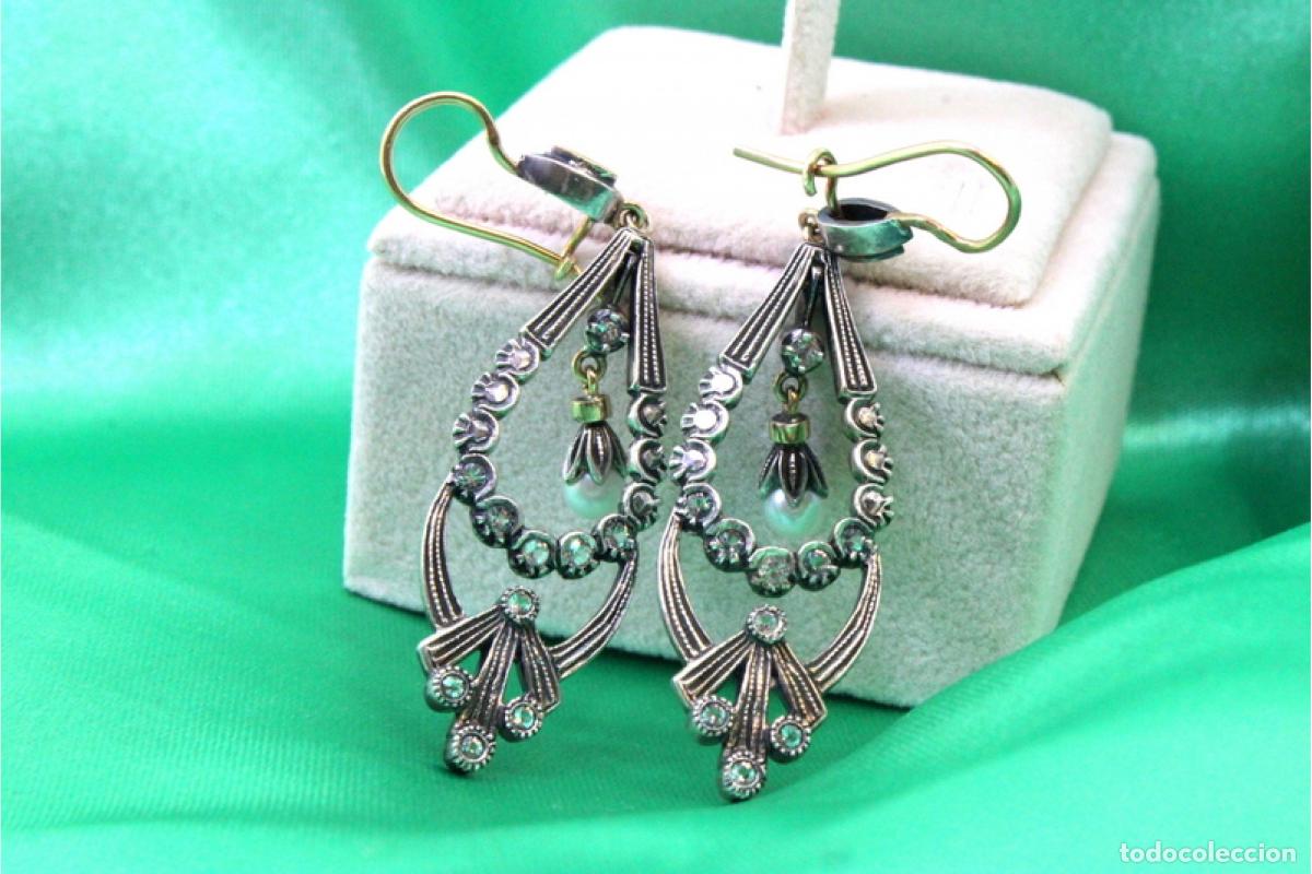 Joaillerie: Pendientes en oro de 19,2K y plata con perlas.
