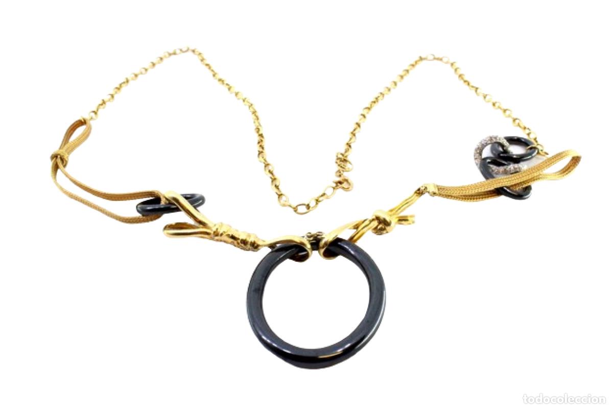 Jewelry: Collar bicolor en oro de 19,2K con diamantes.