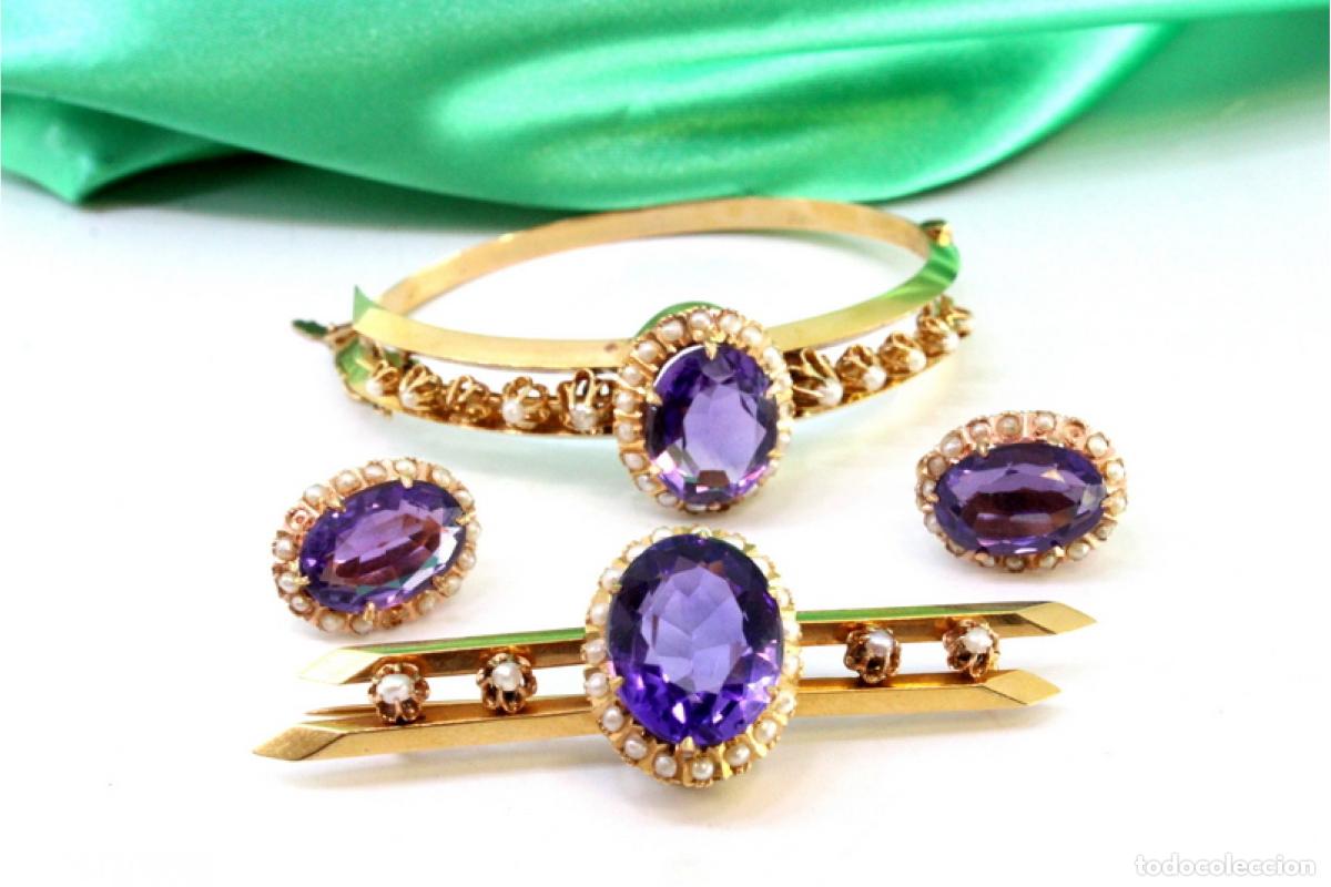 Schmuck: Conjunto de pulsera, broche y pendientes en oro de 19,2K con perlas y amatistas.