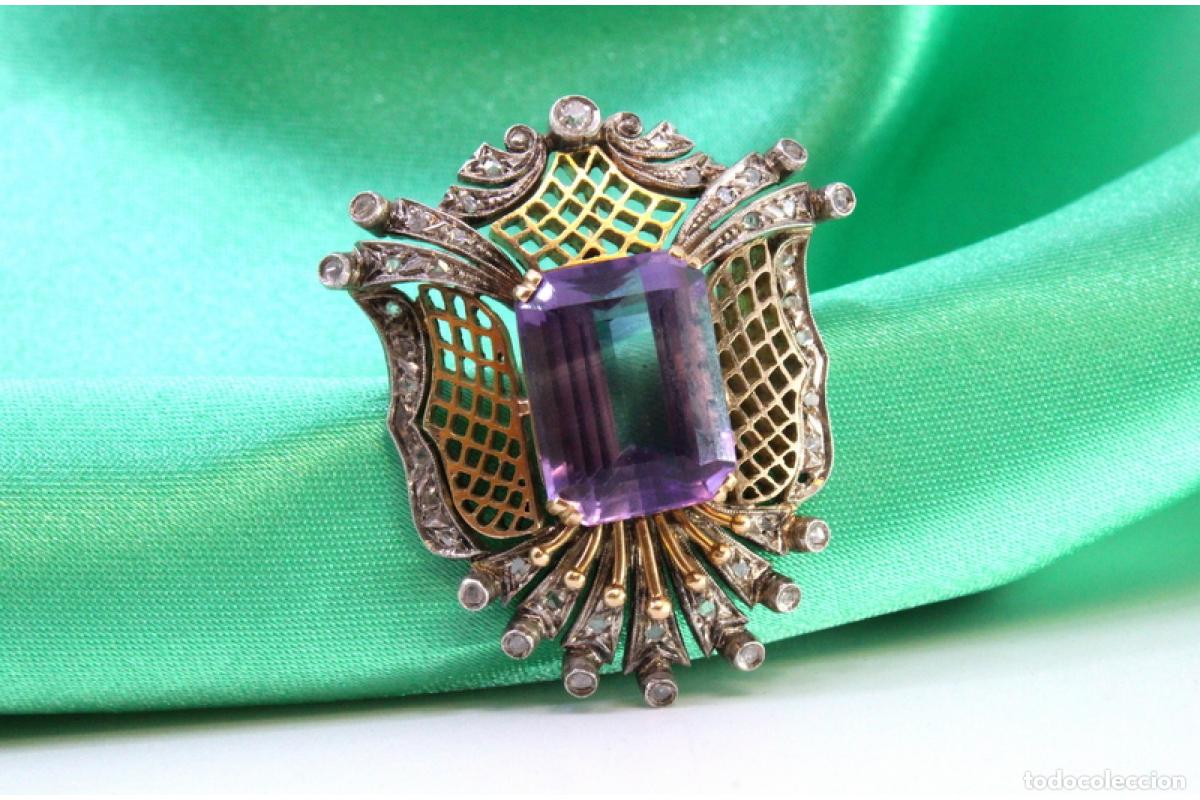 Gioielleria: Broche en oro y plata de 19,2K con diamantes y amatista.