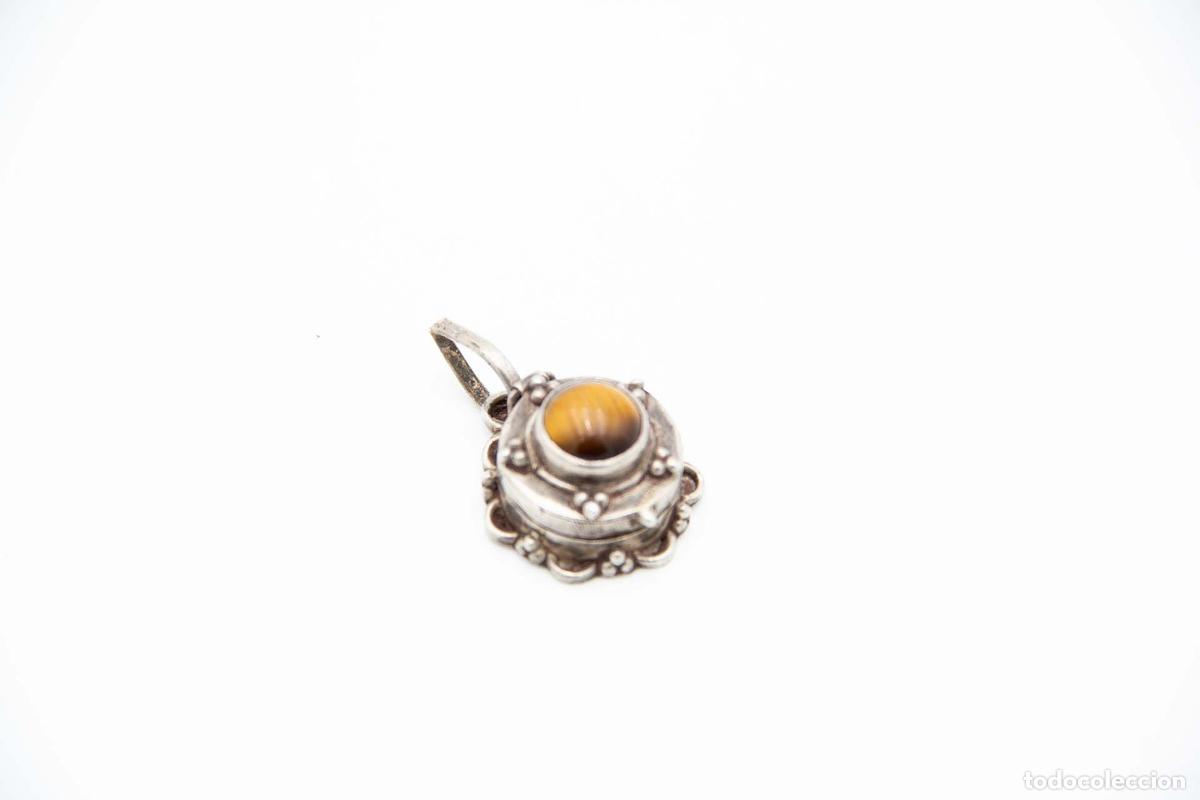 Joaillerie: colgante de plata
