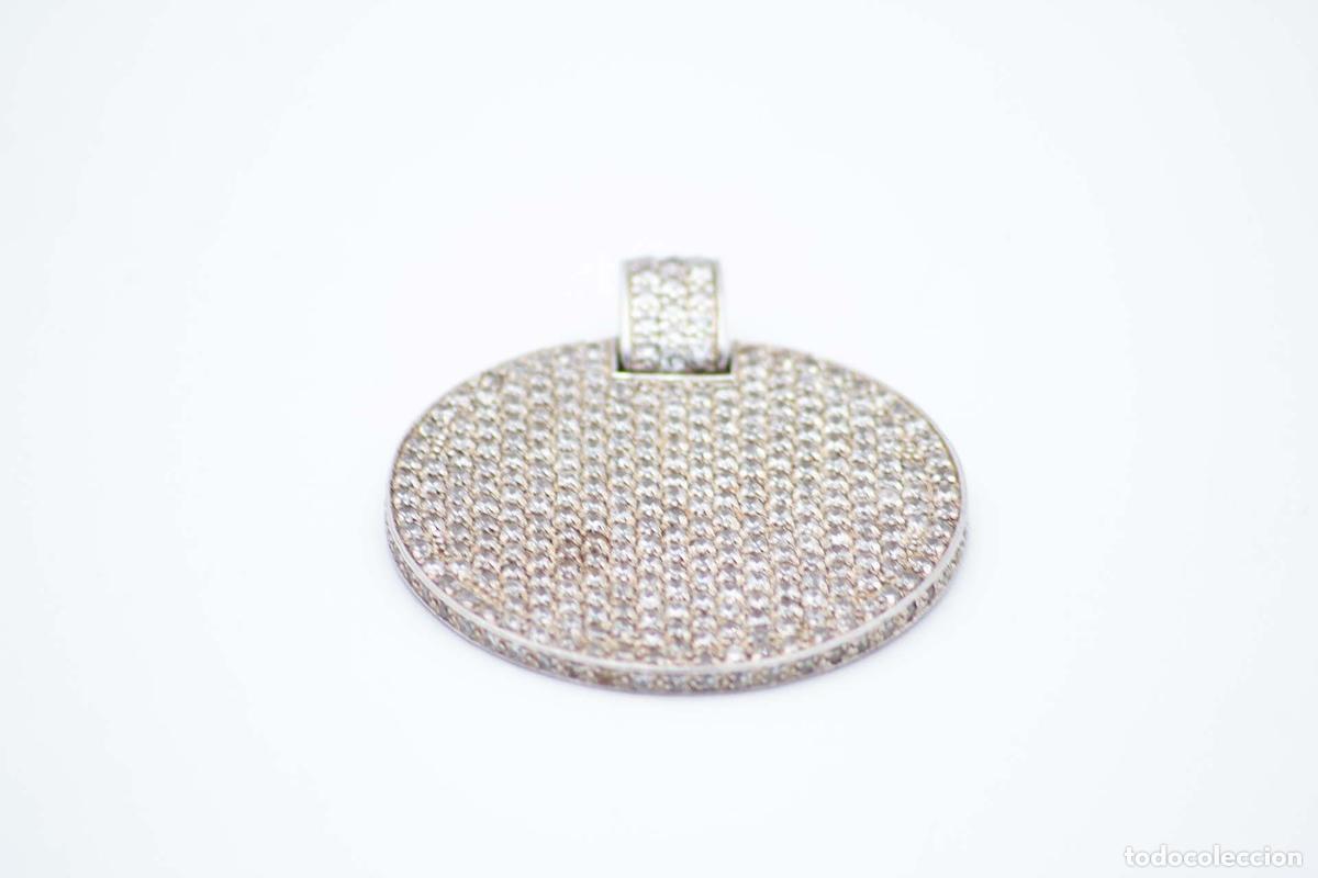Gioielleria: colgante de plata