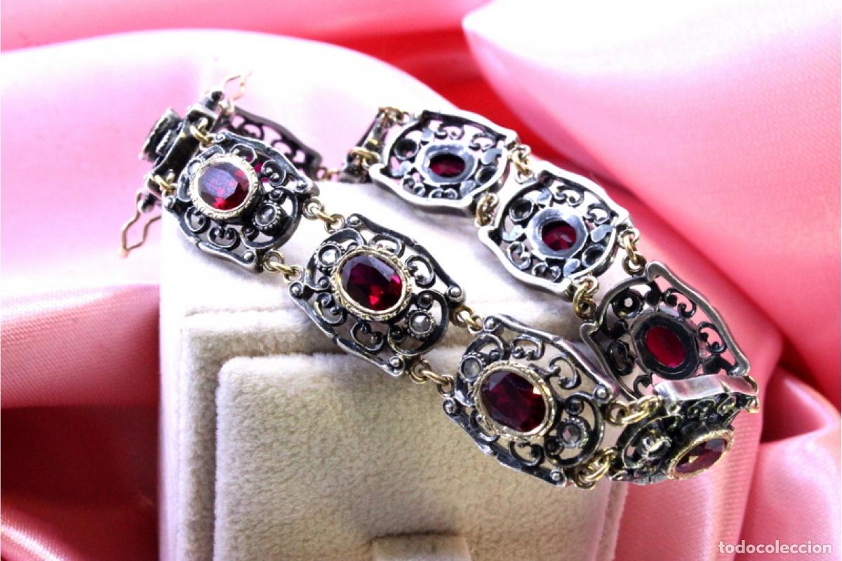 Gioielleria: Pulsera en oro y plata de 19,2K con rub&iacute;es y diamantes.