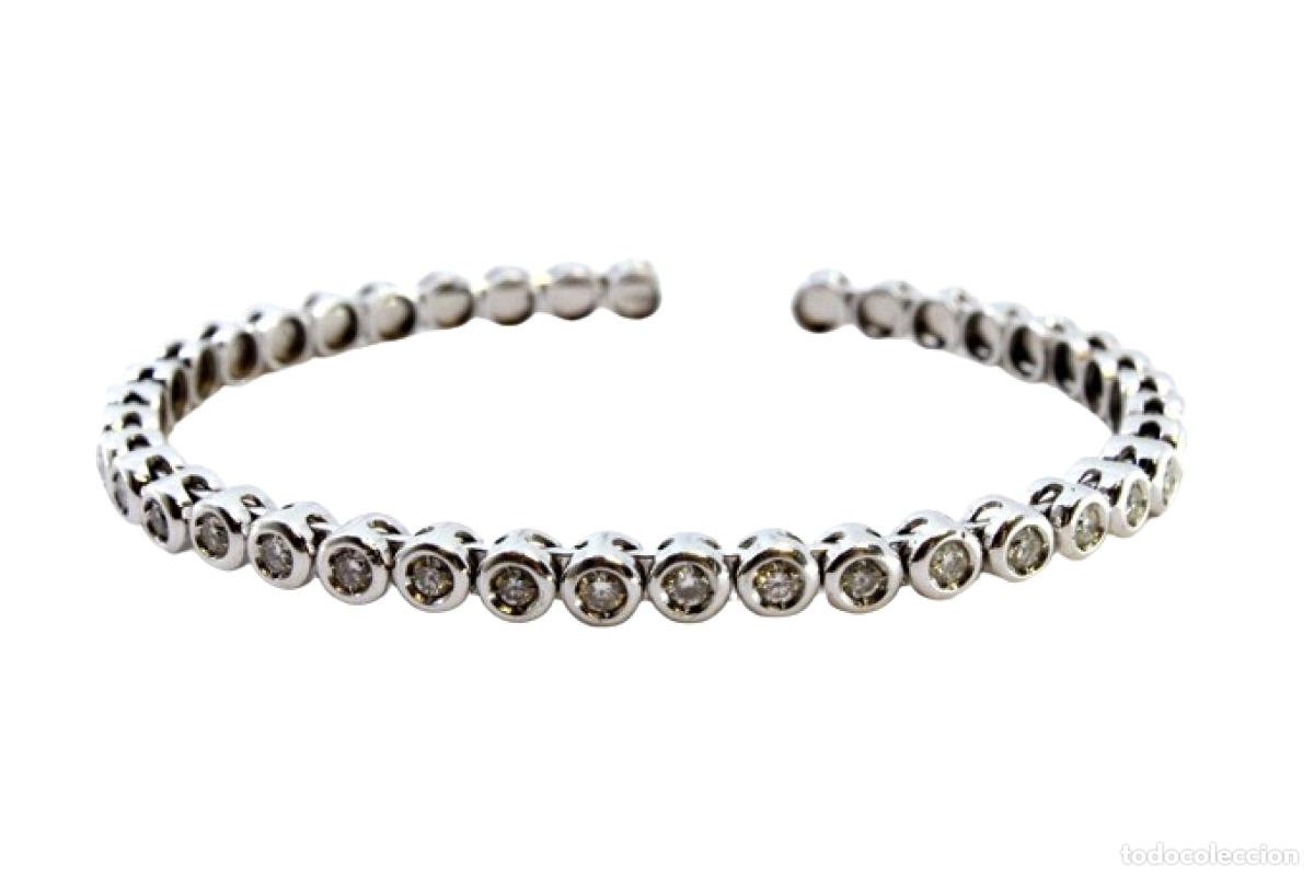 Schmuck: Pulsera de oro blanco de 18 quilates con diamantes.