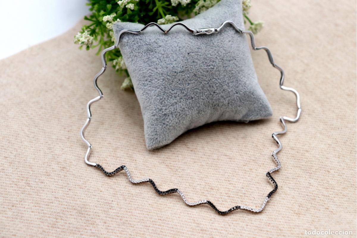 Jewelry: Collar en oro blanco de 19,2K con diamantes blancos y negros.