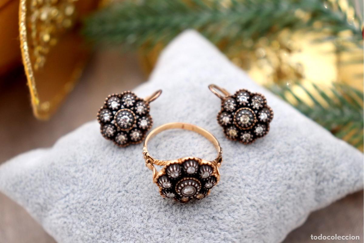 Schmuck: Conjunto de anillo y pendientes en oro y plata de 19,2K con diamantes.