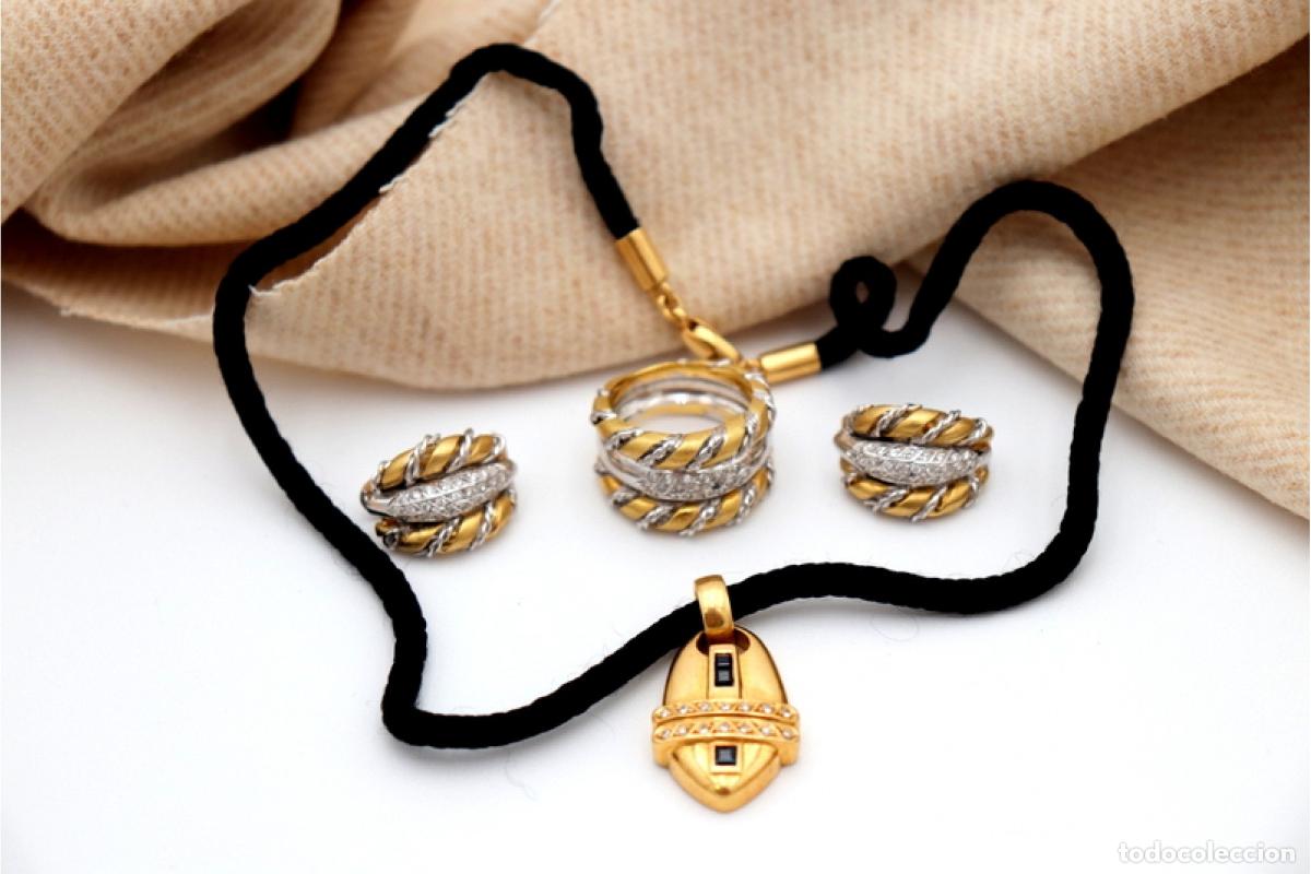 Schmuck: Conjunto de anillo y pendientes en oro bicolor de 19,2K con diamantes.