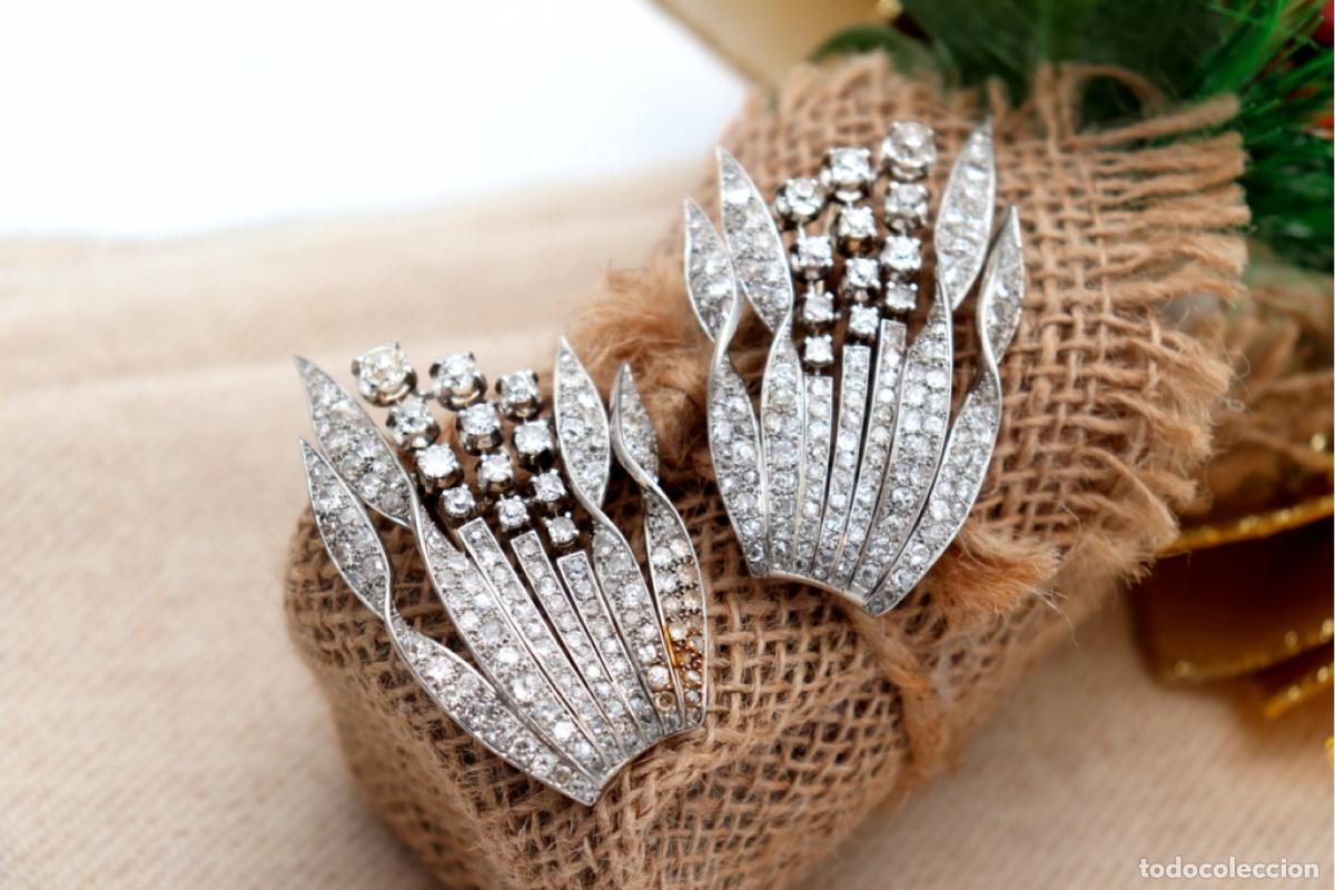 Schmuck: Conjunto de broches en oro de 18K y platino con diamantes.