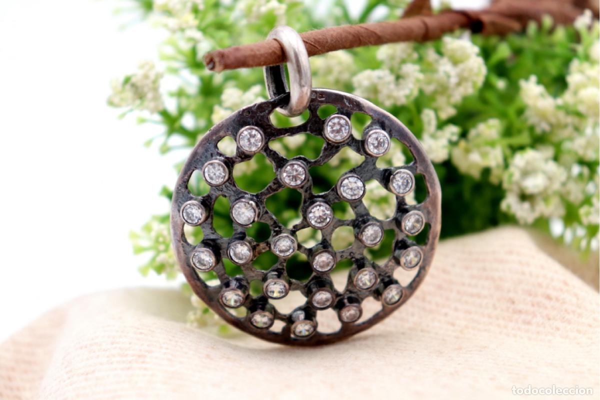 Joaillerie: colgante de plata