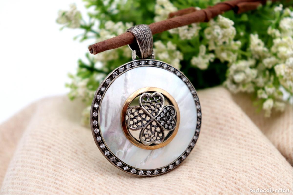 Joaillerie: colgante de plata
