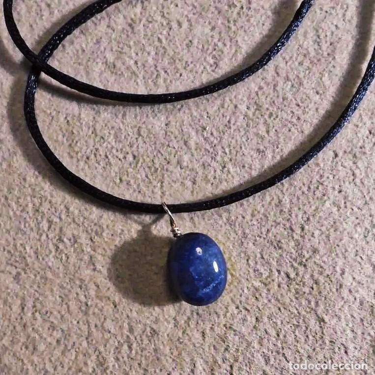 Joyeria: COLGANTE DE ORO AMARILLO CON PEPITA EN ZAFIRO AZUL NATURAL PULIDO. ORO 14 KTES. FRANCIA