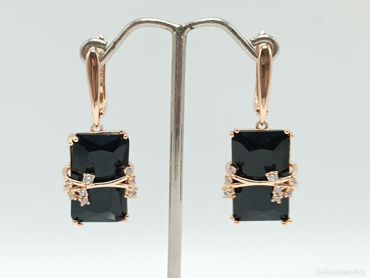 Joalharia: Elegantes pendientes en oro de 14k con espinelas negras