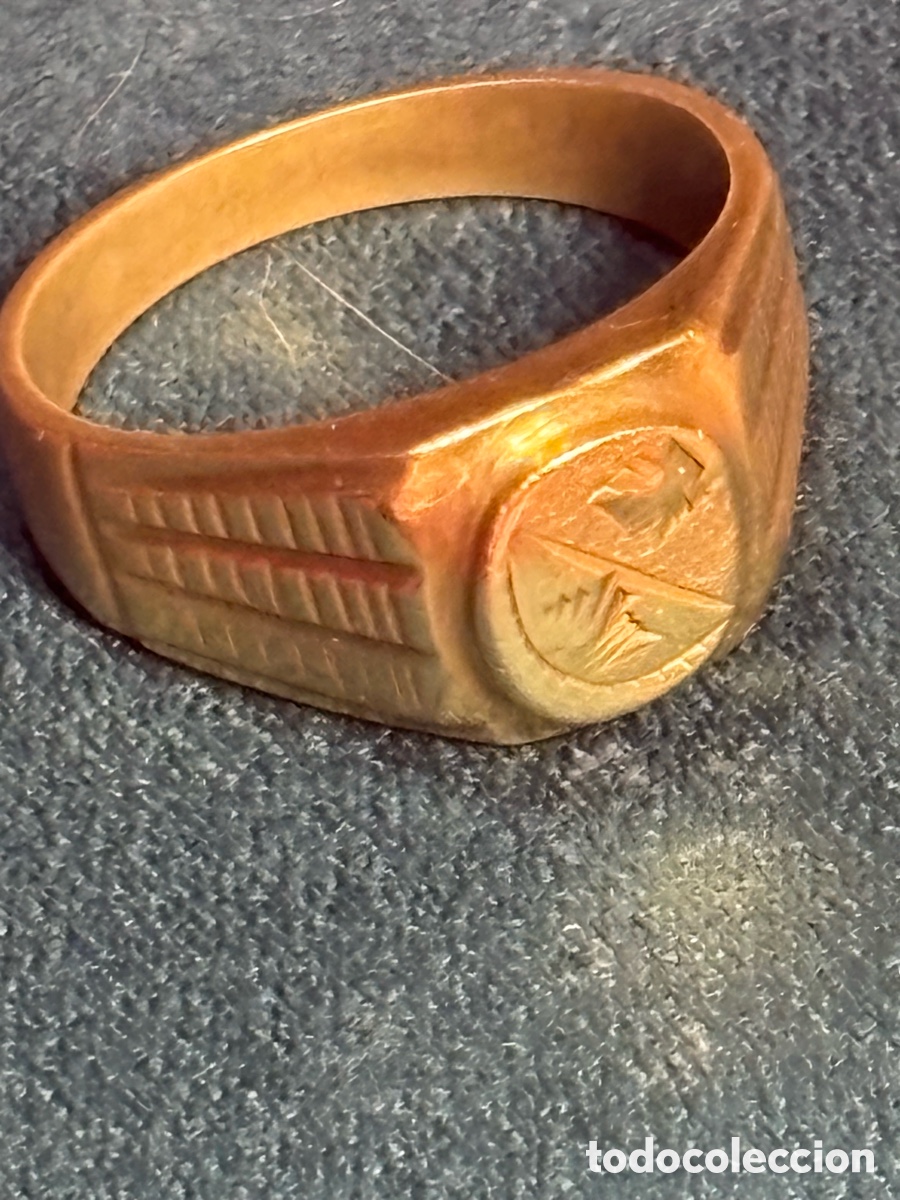 Joyeria: Sello metal dorado .