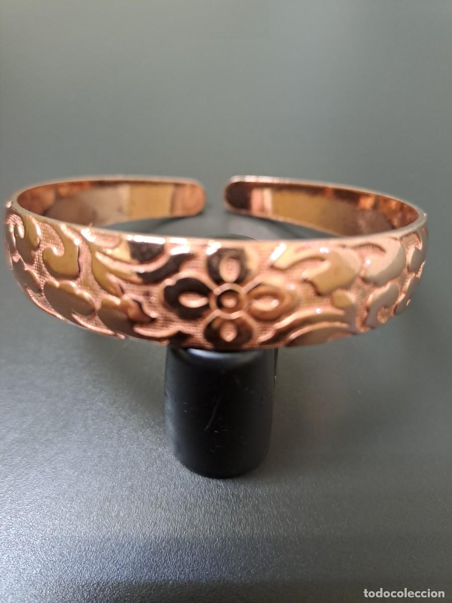 Gioielleria: Pulsera de cobre con flor de cuatro p&eacute;talos en el centro, nueva