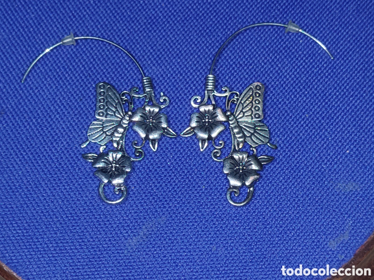 Joyeria: Pendiente mariposa y flores. - Foto 1