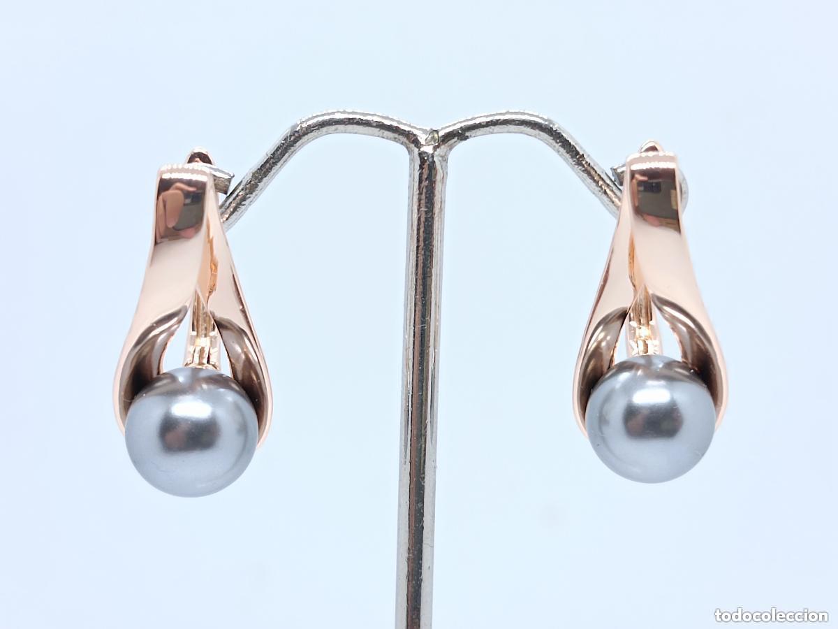 Joalharia: Elegantes pendientes en oro de 14 quilates con perlas