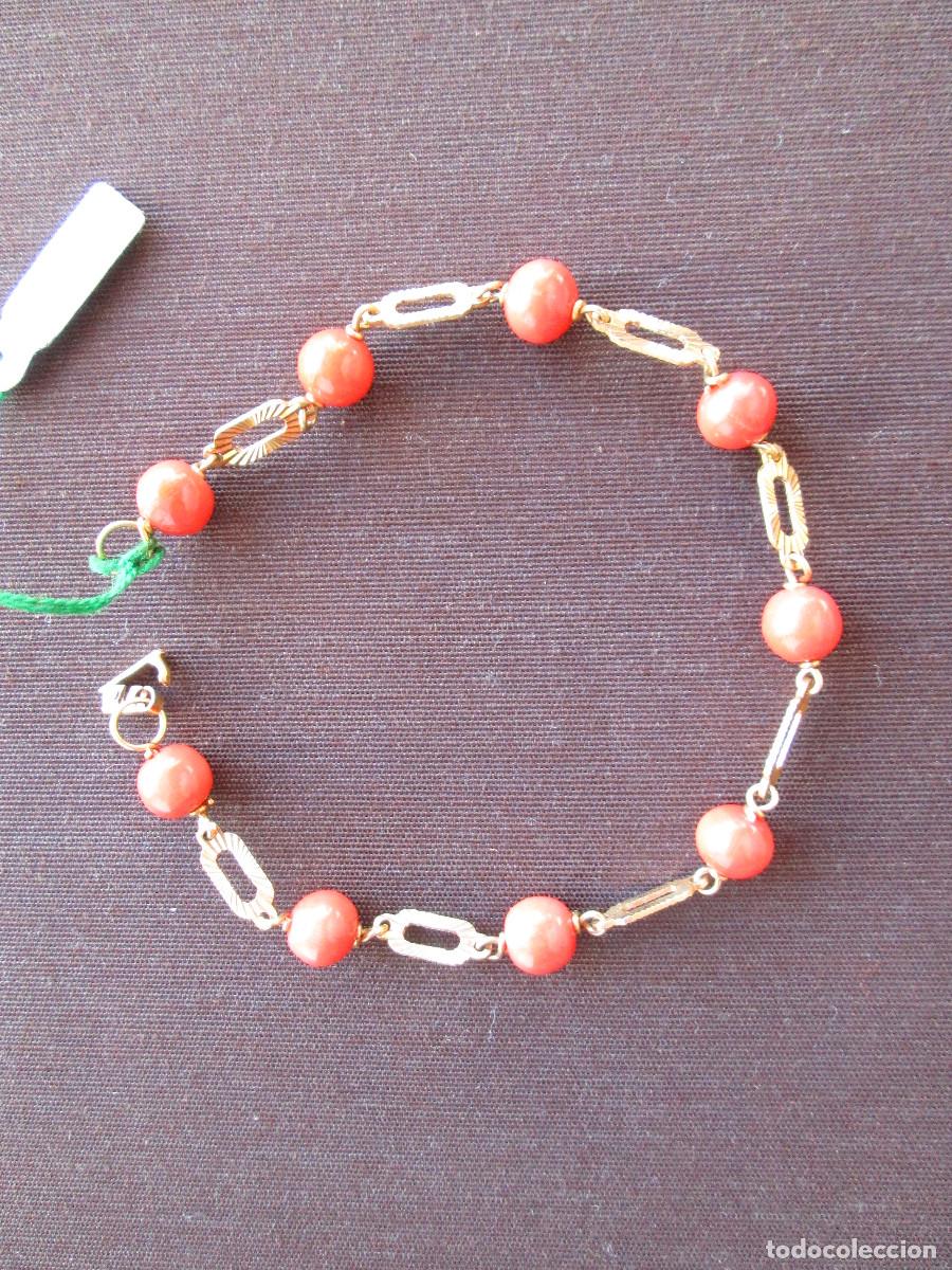 Joyeria: PULSERA DE ORO 18 KLTS CON PERLAS DE CORAL - SIN ESTRENAR