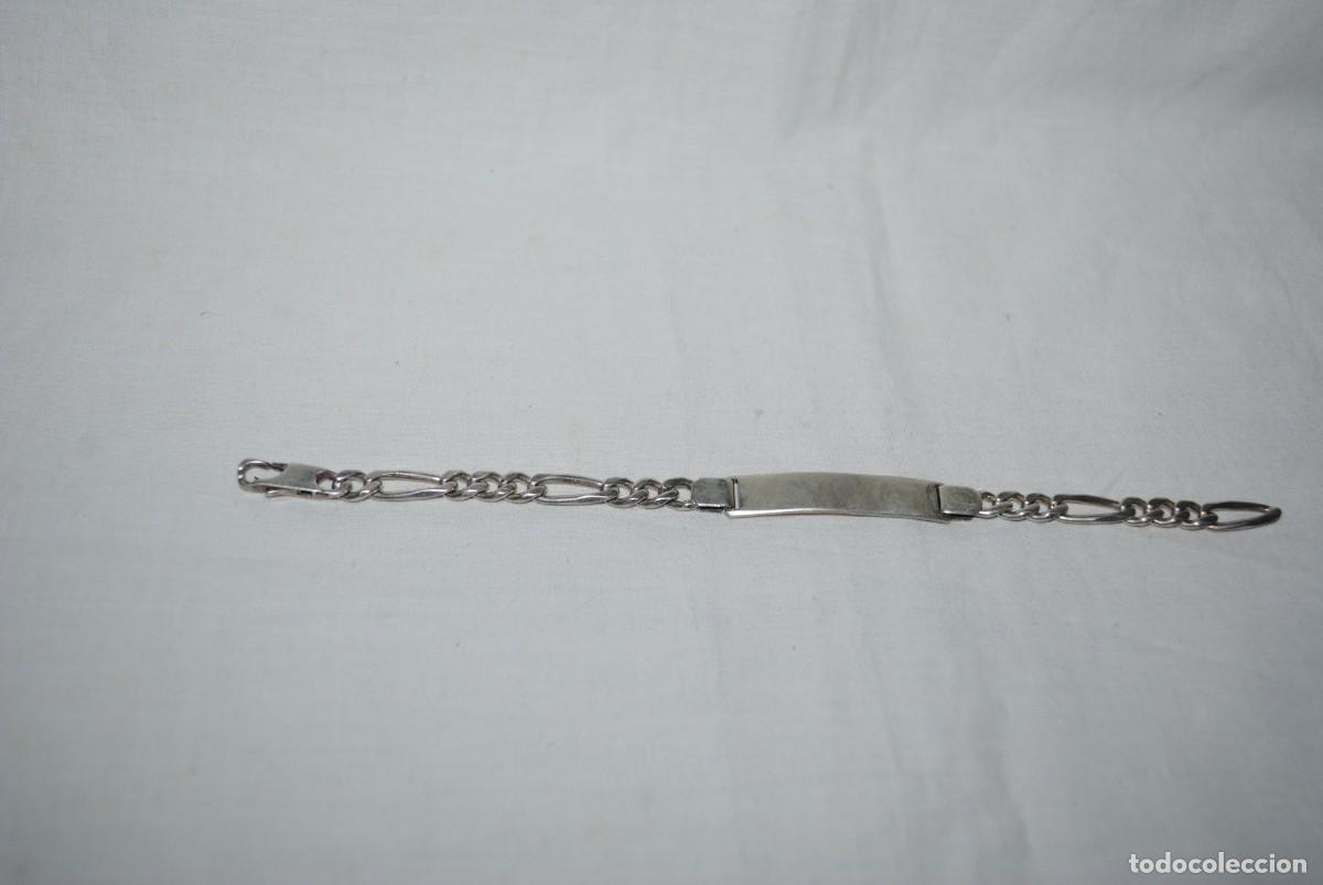 Joyeria: PULSERA DE PLATA EN FORMA SE ESCLAVA CLASICA .