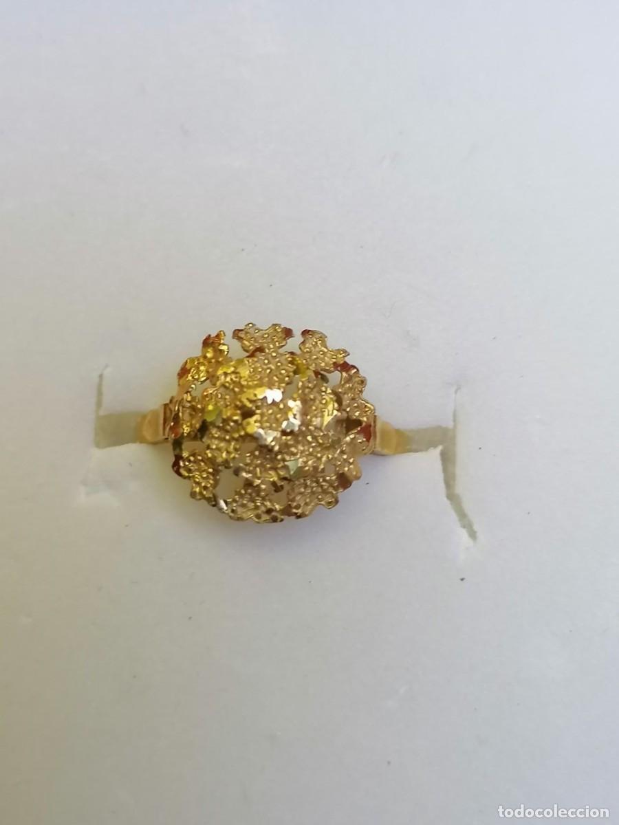 Joyeria: Sortija oro 18K, punzonada