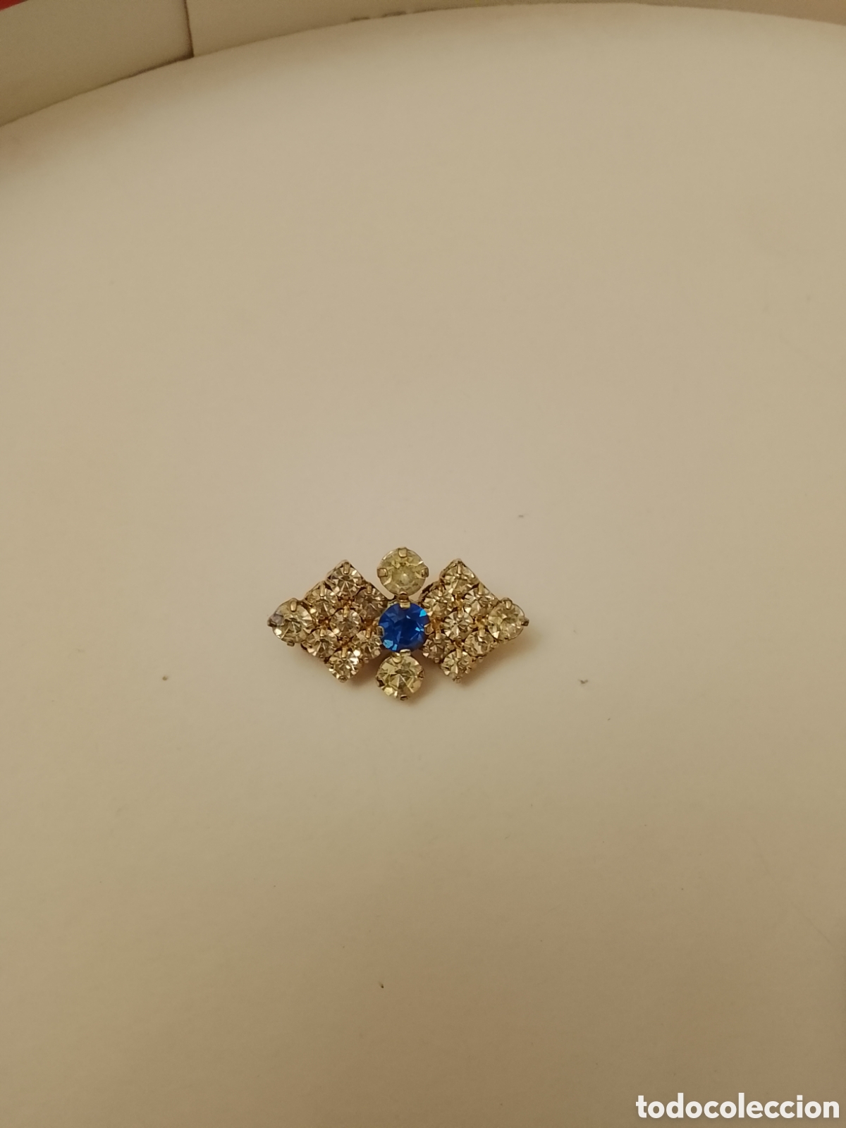Joyeria: Antiguo broche prendedor ,a&ntilde;os 70 .Es de metal plateado y con pedrer&iacute;a engarzada .Leer descripci&oacute;n .