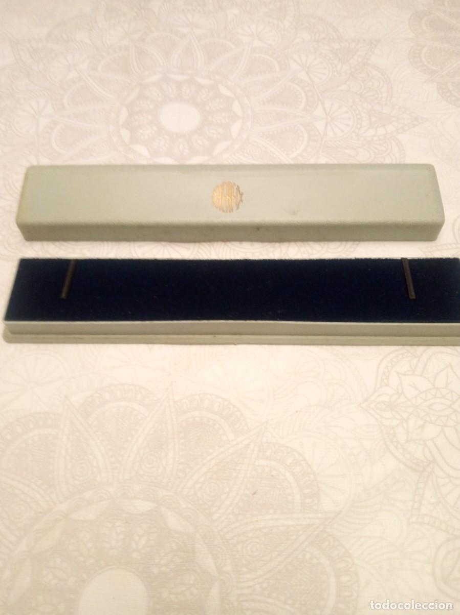 Joyeria: Estuche alargado, pulesera, reloj
