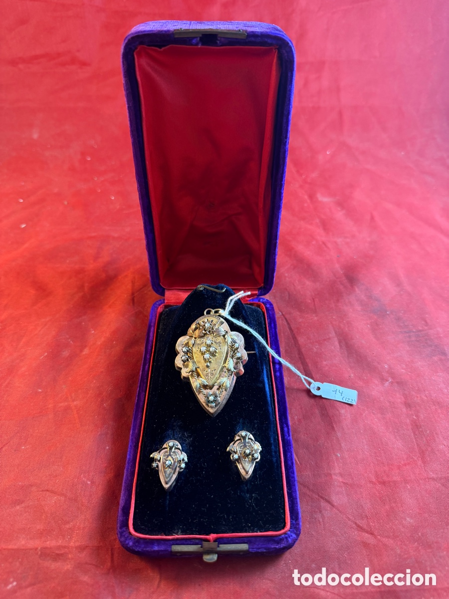 Gioielleria: Conjunto de colgante y pendientes abelinos S. XIX decorados con perlas en oro amarillo de 18K.