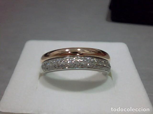 Joyeria: anillo bicolor 18 kts y diamantes