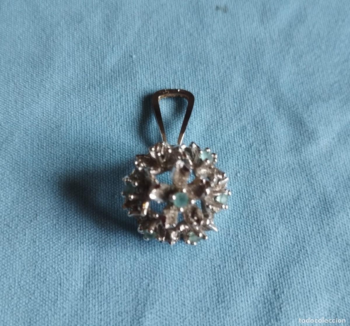 Schmuck: Pendiente de plata con contraste, dise&ntilde;o floral complejo, un ramo tridimensional o copo de nieve