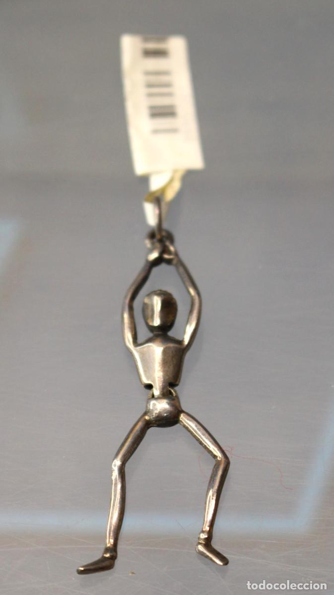 Joyeria: Colgante de plata de ley: Figura humana articulada.
