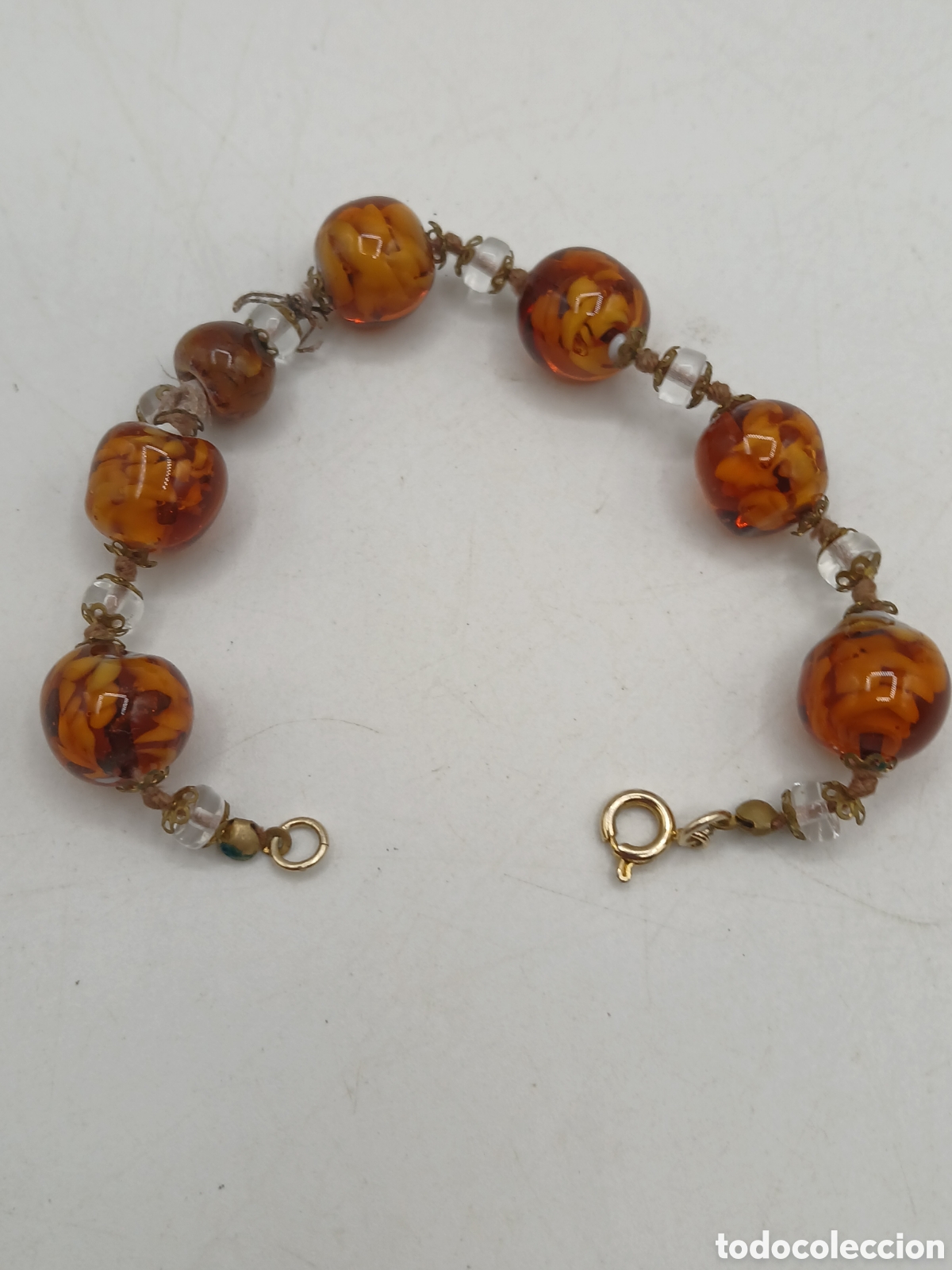 Joyeria: Pulsera cristal de Murano detalles lat&oacute;n. Cierre metal chapado oro