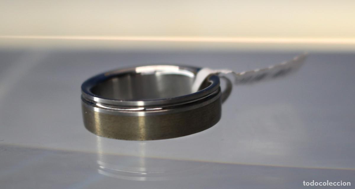 Joyeria: Anillo plata de ley y acero. 19,8 mm, talla 22 &oacute; 23, 7,7 g.