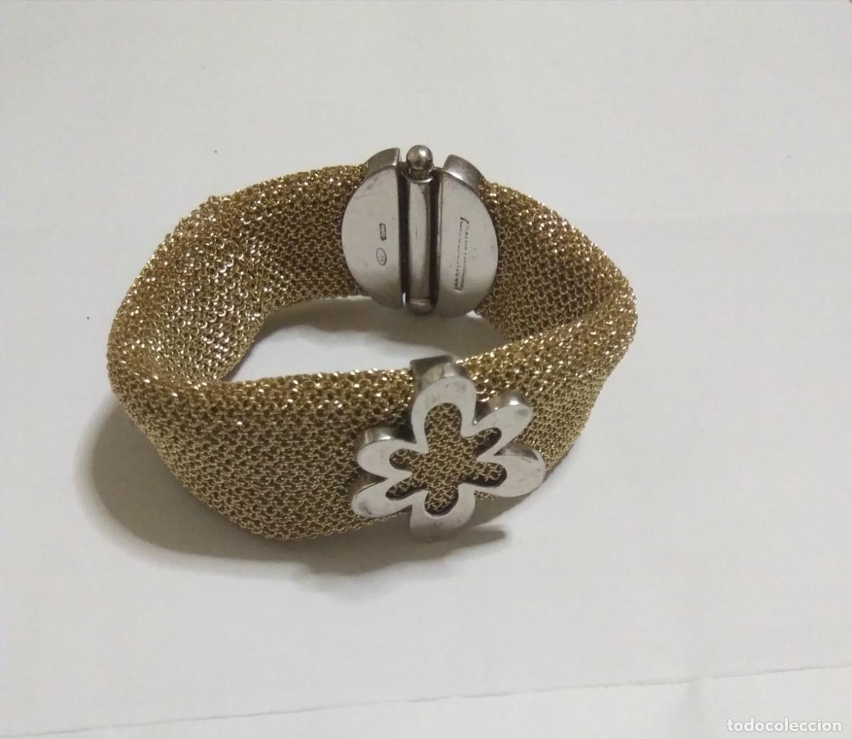 Joyeria: Pulsera brazalete en malla de plata dorada. Adami & Martucci, sello 925