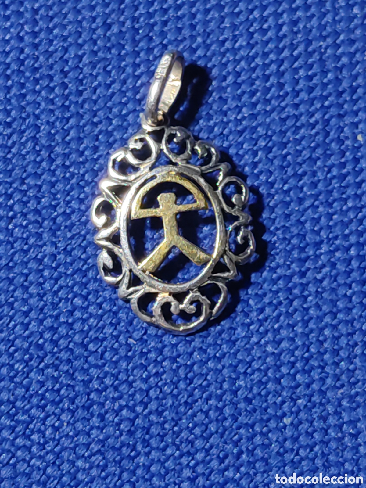 Joyeria: Peque&ntilde;o colgante Indalo de oro y plata calada 925 contrastada.Dije,figa,buena suerte.