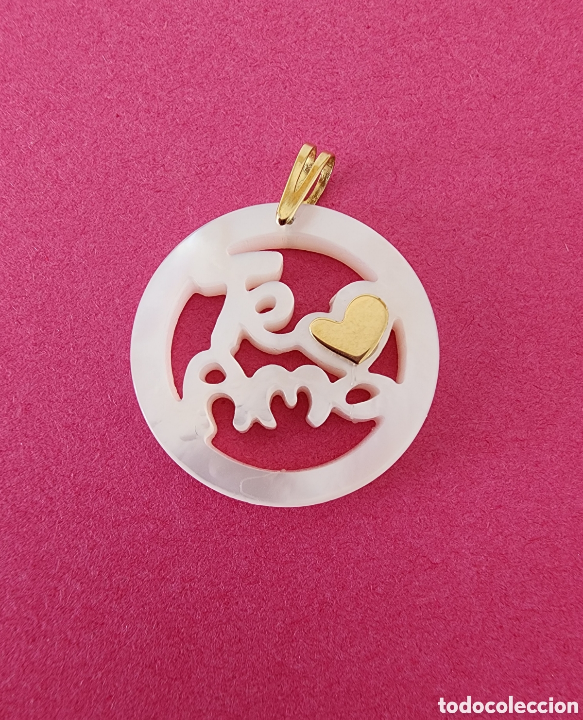 Joyeria: Colgante oro 18k y n&aacute;car