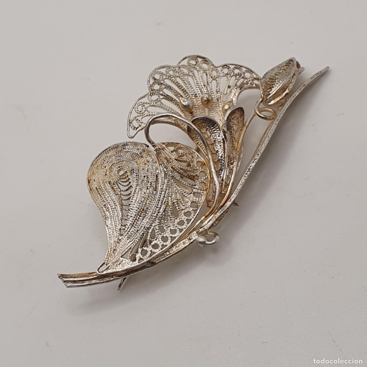 Joyeria: Precioso broche antiguo de bella flor de cala y coraz&oacute;n en filigrana de plata de primera ley 925.