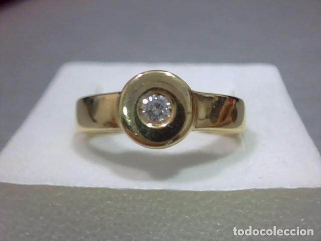 Joyeria: anillo en oro 18 kts con diamante