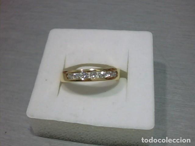 Joyeria: anillo en oro 18 kts con 7 diamantes